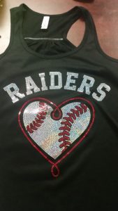 A sleeveless top with a heart-shaped football and the text, “Raiders”